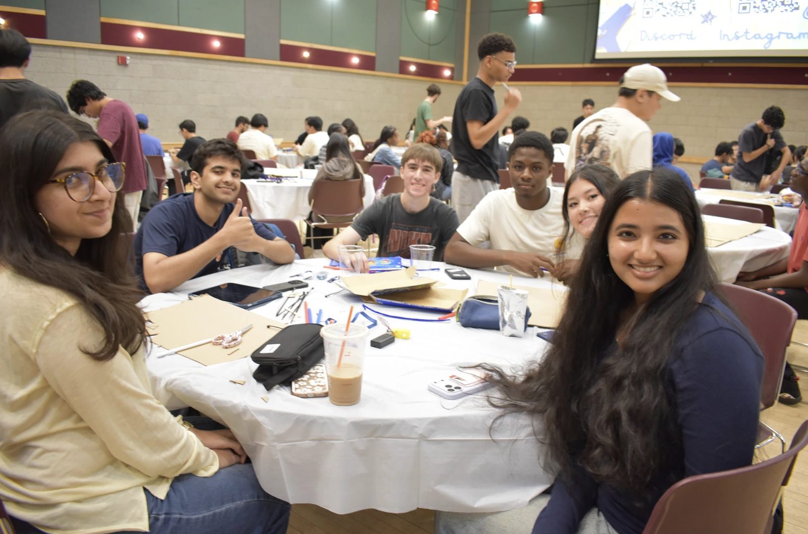 Students building robots at the Build-a-Bot GBM